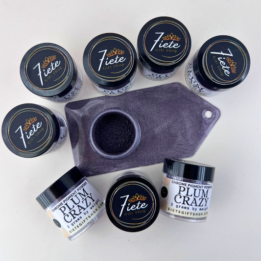 Jars of Plum Crazy chrome pigment powder from Siete Gift Shop displayed with a purple swatch sample showing a deep metallic plum finish.