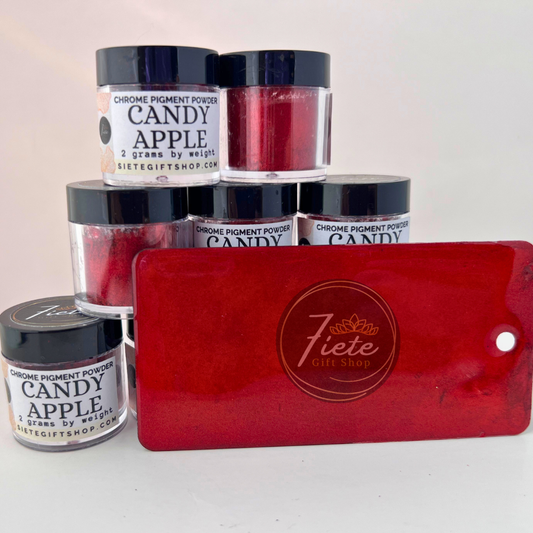Candy Apple chrome pigment powder in a 2g jar from Siete Gift Shop displayed with multiple jars and a deep red metallic color swatch card.