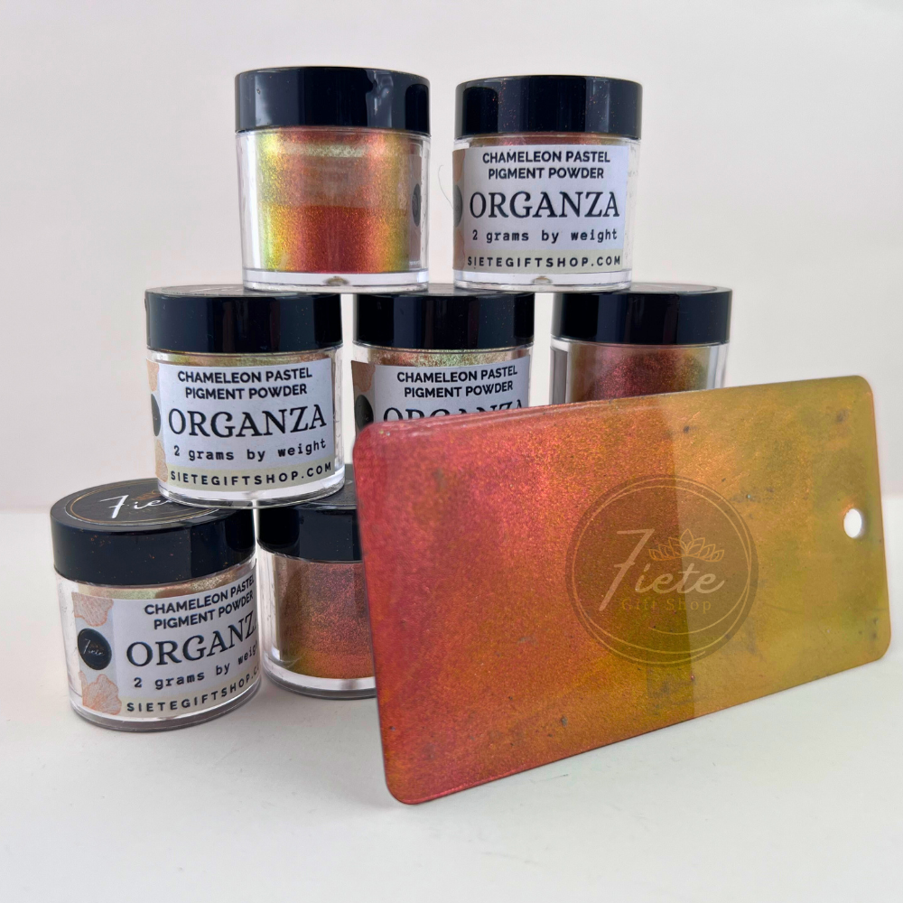 Jar of Organza chameleon pastel pigment powder from Siete Gift Shop showing gold, coral, and green color shift with pigment swatch