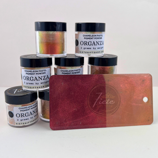 Jar of Organza chameleon pastel pigment powder from Siete Gift Shop showing gold, coral, and green color shift with pigment swatch