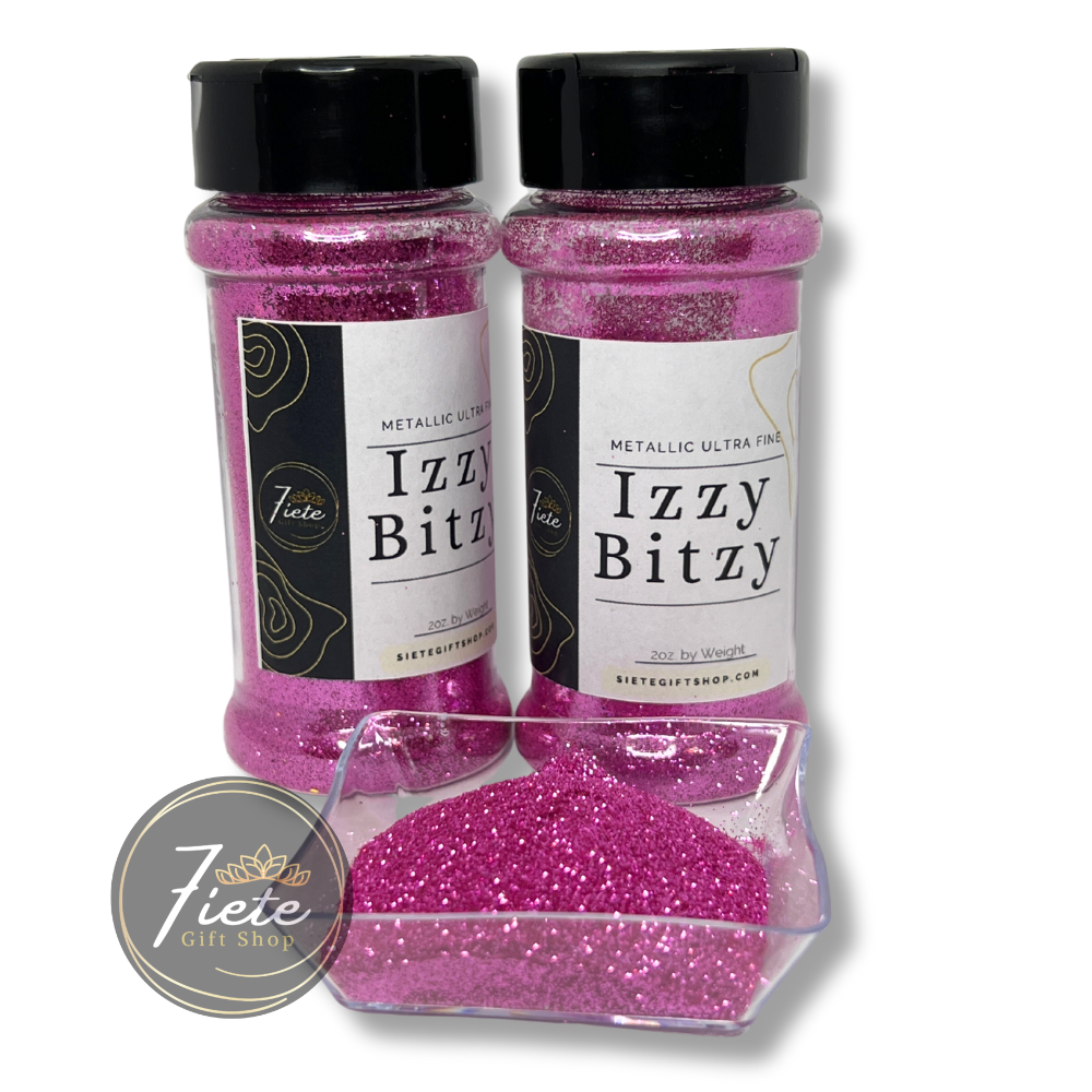 Two clear plastic bottles with black lids. Labels with company logo from Siete Gift Shop.com the words "Metallic Ultra Fine", "Izzy Bitzy", "2oz by weight. The bottles are full of pink ultra find glitter. A small square tray is in front of the bottles full of glitter. 