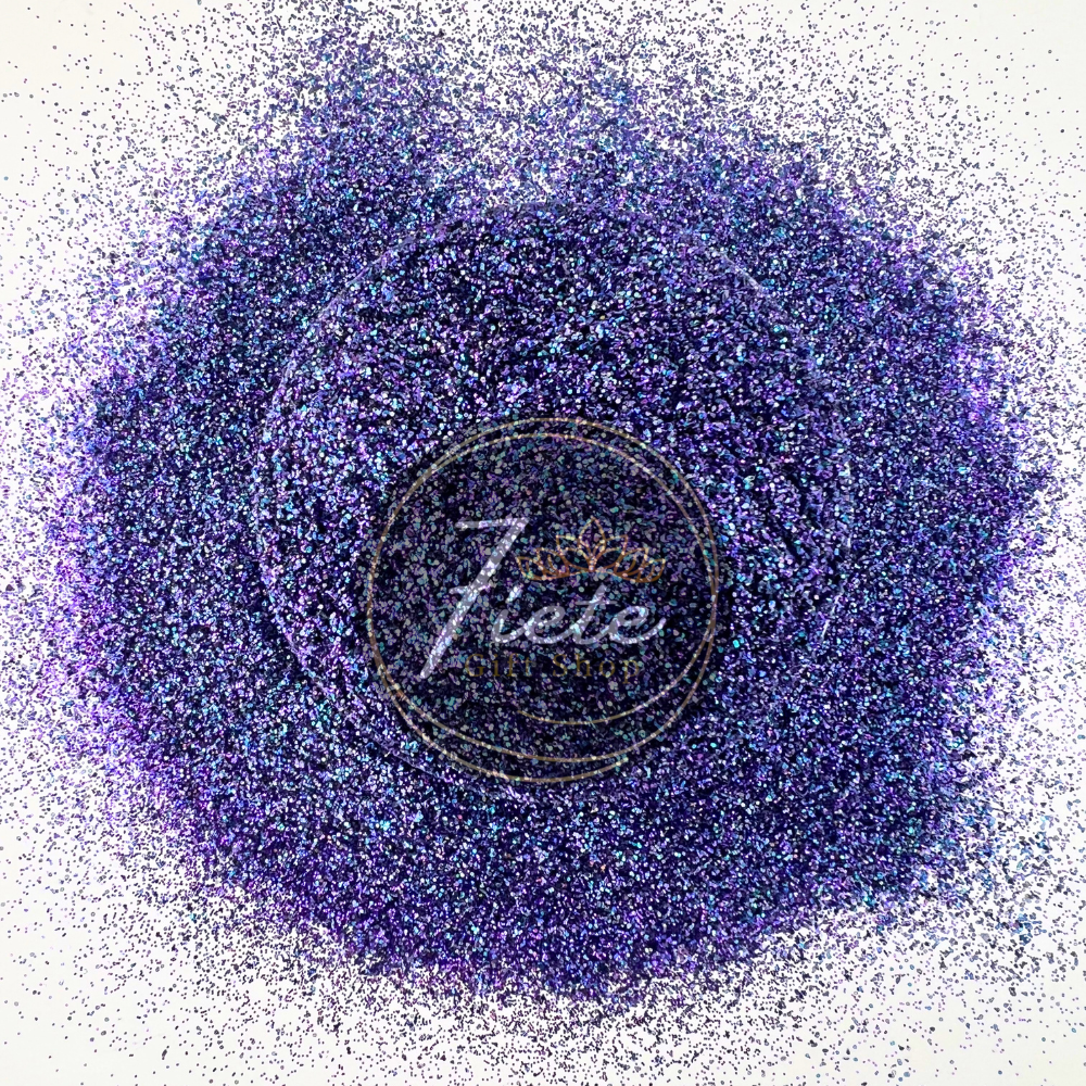 "Masquerade glitter blend in rich jewel tones of purple, green, and gold with iridescent sparkle in a premium craft glitter mix."